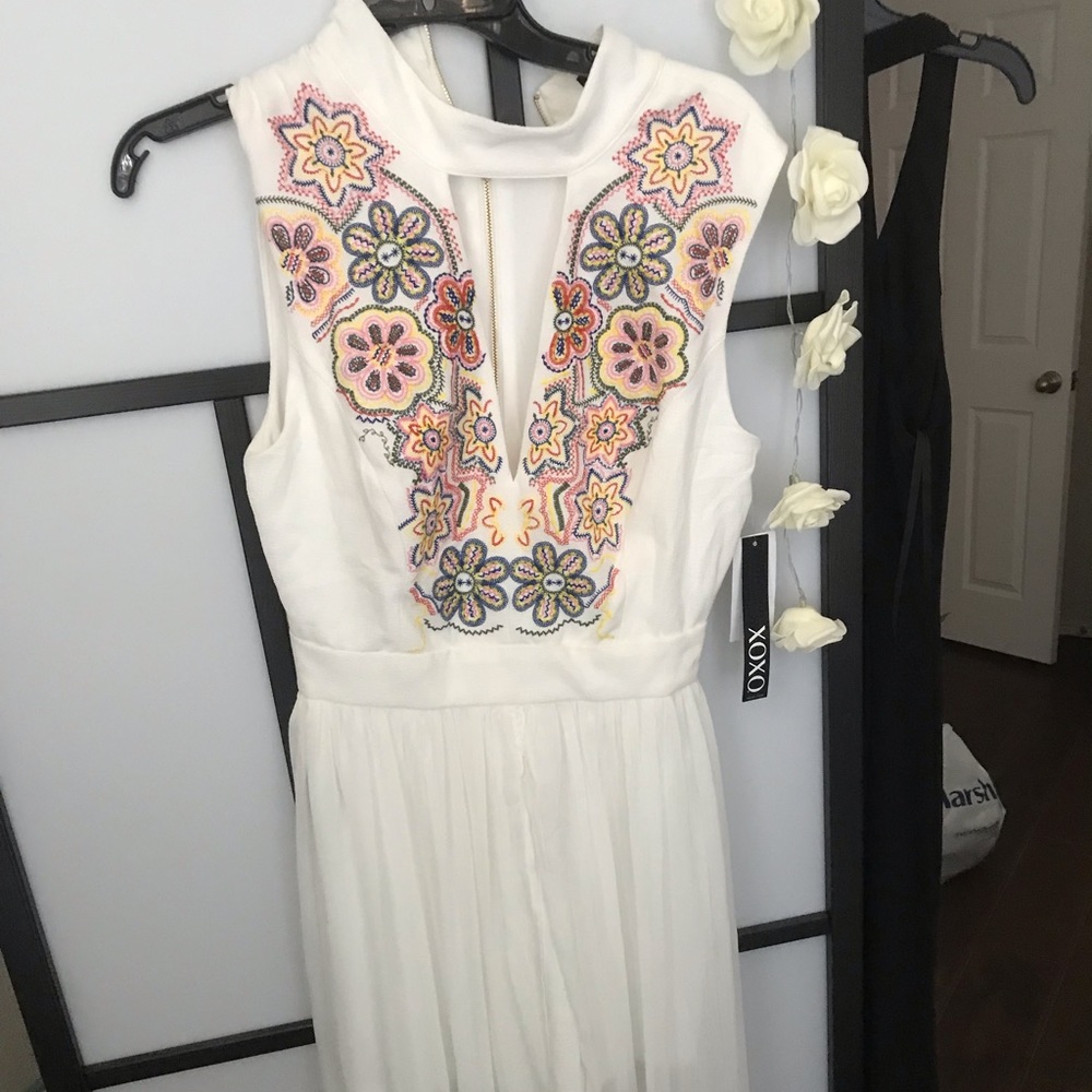 Xoxo white romper plunged neck with skirt